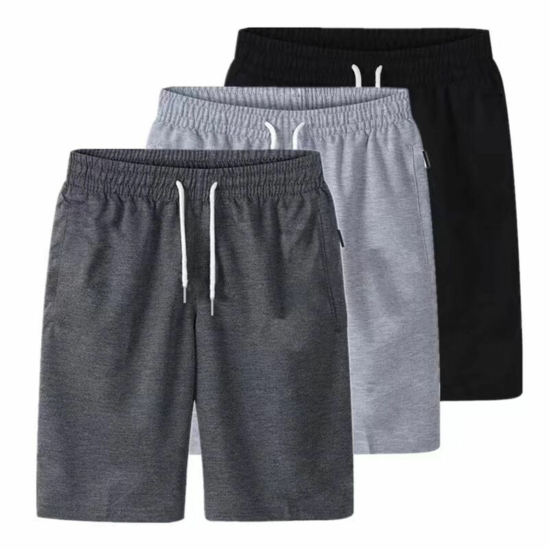 Męskie sportowe kieszonkowe jednolite sznurek do kufra krótkie spodnie plażowe spodenki letnie cienkie spodnie zapinane na suwak kieszonkowe luźne spodnie dresowe