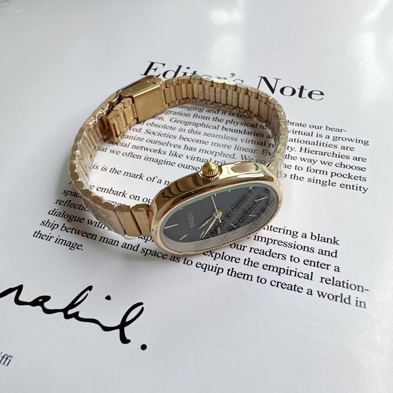 Damski zegarek kwarcowy luksusowy w owalnym kształcie modny Mini futerał mały cyfra rzymska tarcza damski zegarek w pełnym zespół metalowy niszowy zegarek na rękę