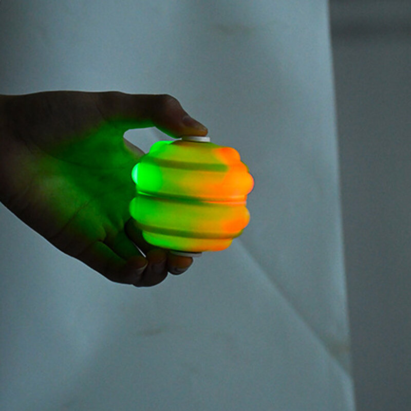 Bola antiestrés de silicona brillante para bebé, juguete sensorial de hoyuelos simples con luz LED, burbuja Pop colorida
