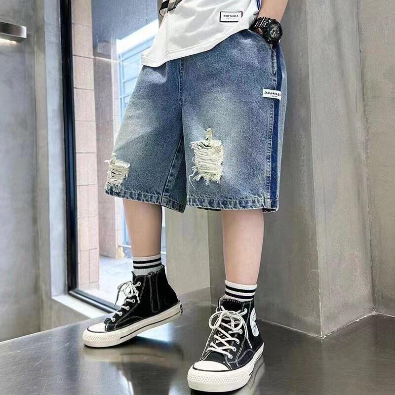 Celana pendek Denim anak laki-laki dan perempuan, Jeans sobek Korea kasual longgar musim panas 2024