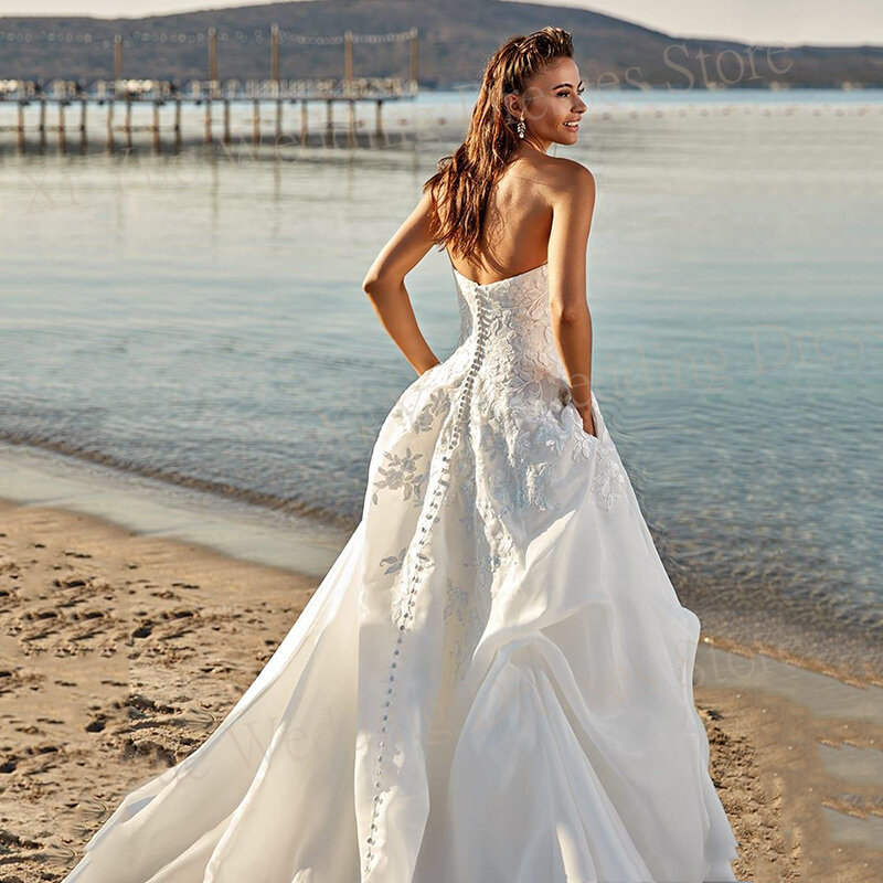 Schöne Prinzessin eine Linie Brautkleider mit Tasche Schatz moderne rücken freie Brautkleider Spitze Applikationen vestidos de novias