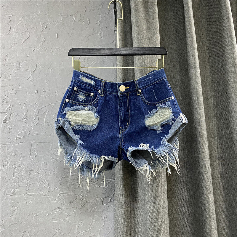 Sexy Jeans shorts mit niedriger Taille 2024 neues Sommer loch eine Hose mit weitem Bein, zerrissene Jeans für Frauen