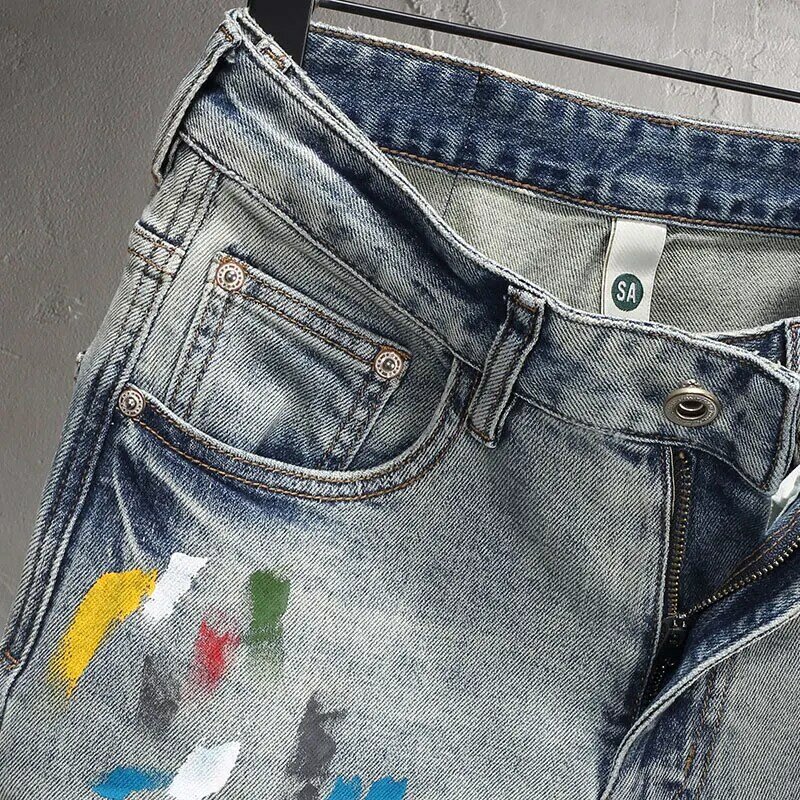 Modne dżinsy męskie uliczna Retro sprany niebieski elastyczna rozciągliwe dopasowanie Fit podarte malowane dżinsy męskie Hip Hop Vintage spodnie dżinsowe Hombre