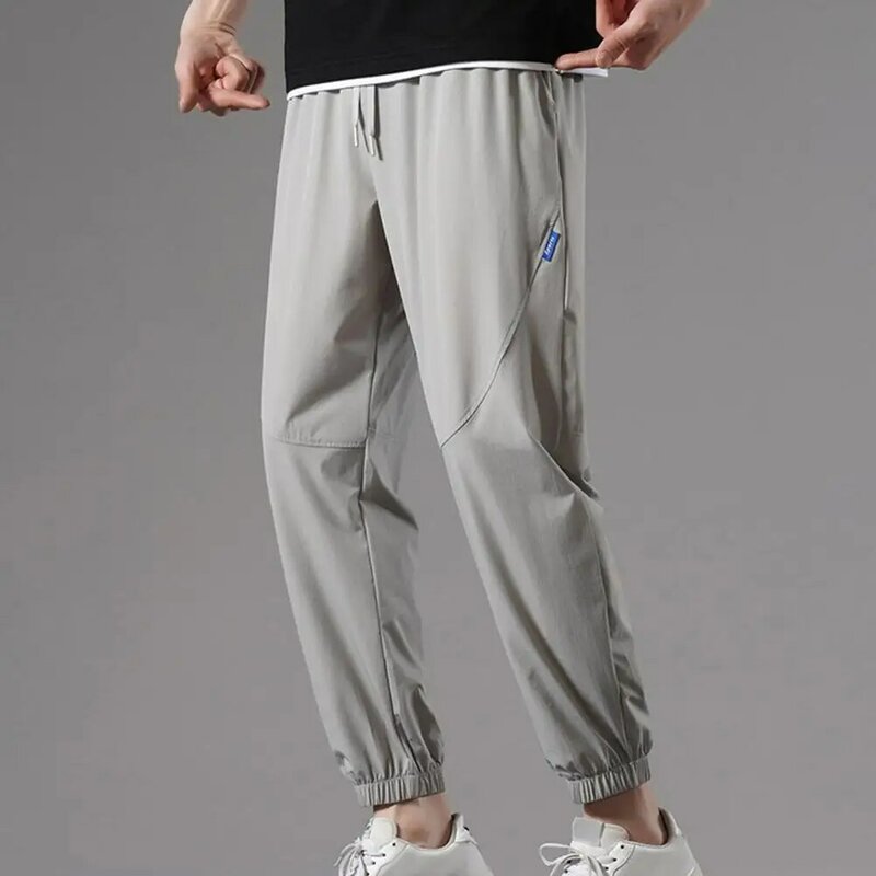 Pantalones atléticos de secado rápido para hombre, pantalones deportivos con bolsillos laterales, cordón de cintura elástica, talla grande, Color sólido para trotar