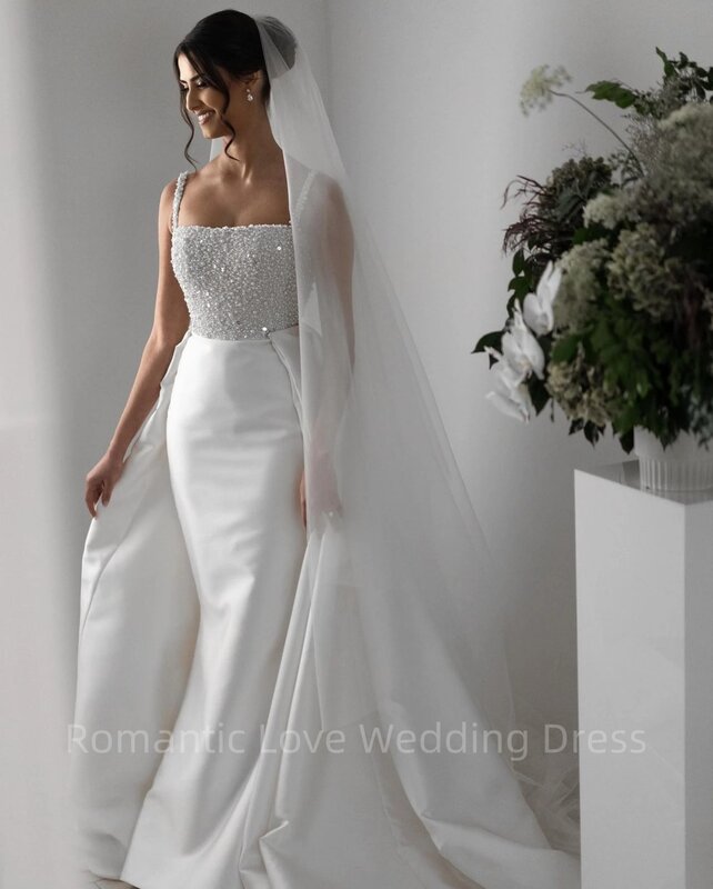 Gaun pernikahan manik-manik mutiara putri duyung tali spageti elegan baru dengan gaun pengantin 2024 kereta lepas pasang vestidos de novia