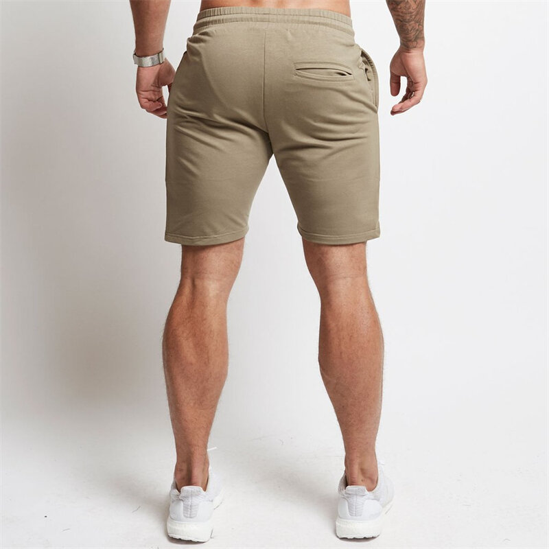 Pantalones cortos ajustados de algodón para hombre, pantalón de chándal informal bordado, color caqui, a la moda, para correr y hacer ejercicio