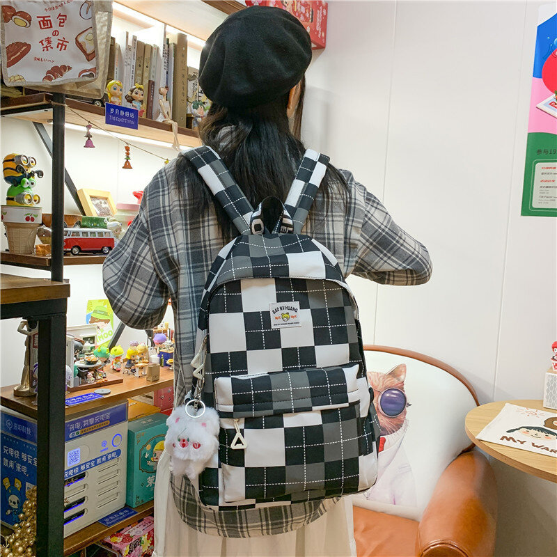 Schoolbag female college student high face value simple and lovely girl lattice Korean high school student ins Backpack