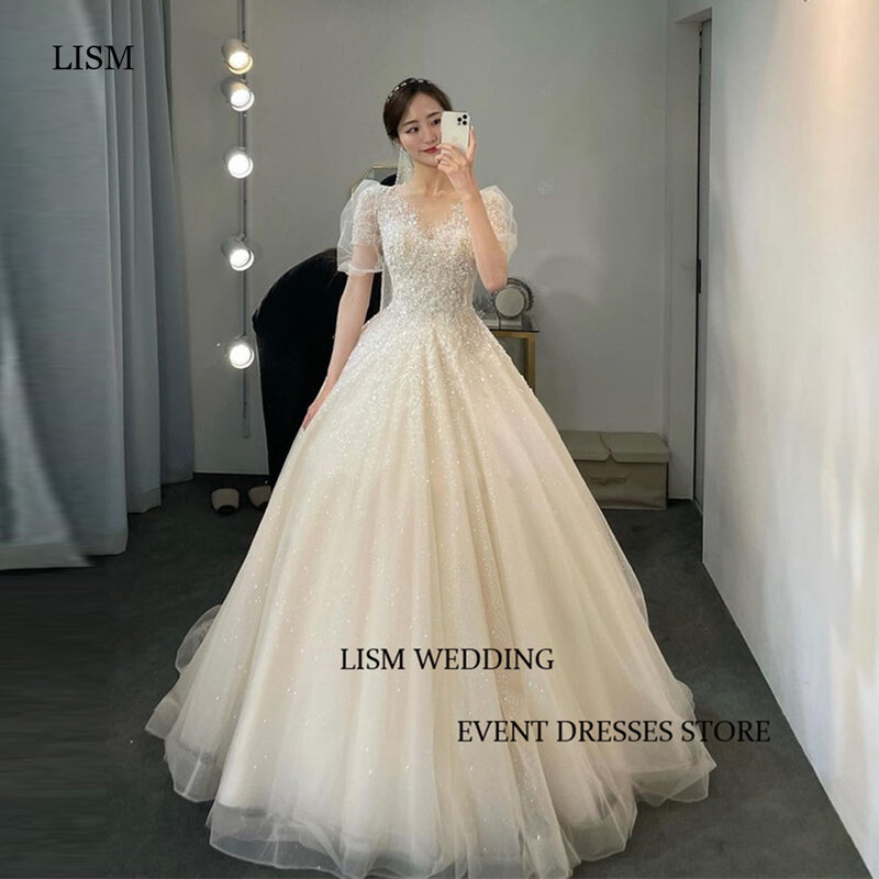 LISM brokat księżniczka linia koreańska suknie ślubne Puff krótkie rękawy V dekolt błyszczące suknie ślubne sznurowane z tyłu błyszczące sesja zdjęciowa