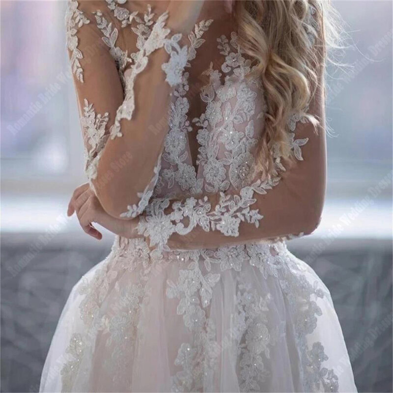 Tiulowe długie rękawy damskie suknie ślubne z okrągłym kołnierzem suknie ślubne eleganckie puszyste obszycia w linii a depcze długość Vestidos De Novia