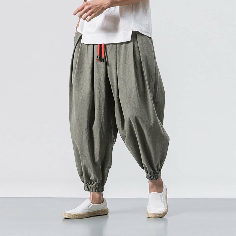 Pantalones bombachos de Color liso para hombre, ropa deportiva elástica, holgada, informal, a la moda