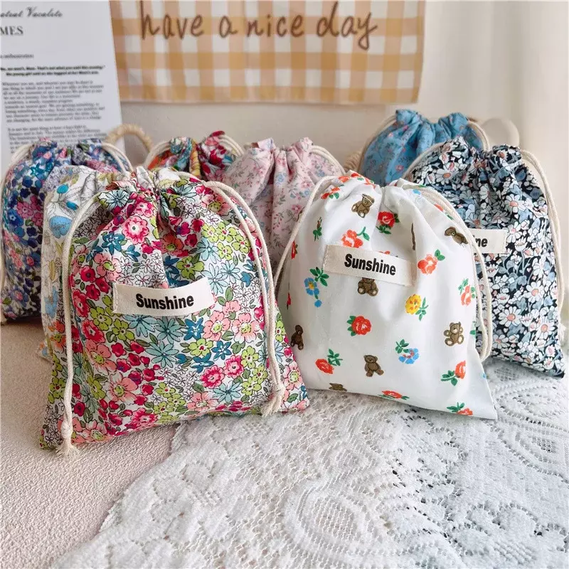 Bolsa de pañales con estampado de flores para bebé, bolsa de algodón con bolsillo para cochecito, bolsa de almacenamiento de pañales para viaje al aire libre