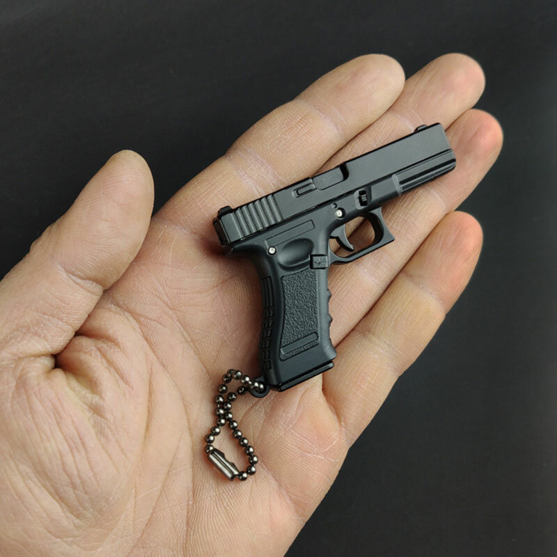 พวงกุญแจปืนไรเฟิลโลหะ1:3ใหม่มีหลายประเภทกันความเครียดรุ่นเล็กเบเร่ต้า92F โคลท์1911กล็อค17 kado ulang tahun