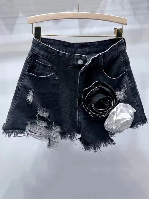 [EWQ] pantaloncini floreali in Denim Street Wear per pantaloni corti da donna New Fashion Washed Hole a-line Wrap Hip 2024 primavera estate 16 u9079