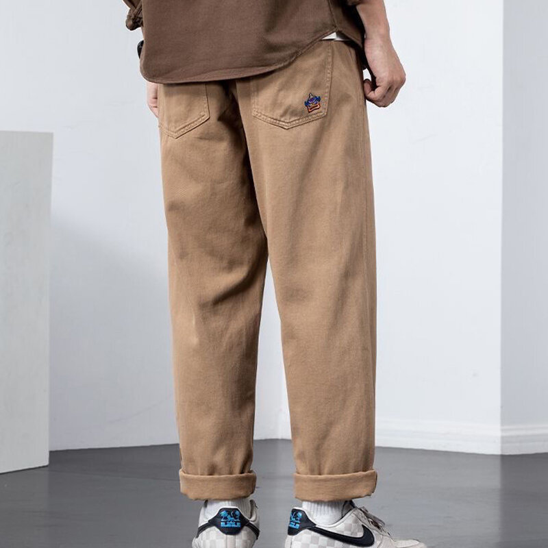 Calça masculina monocromática elástica de cintura larga, calça de algodão puro, bolsos soltos, retalhos, moda de rua alta, primavera, outono, nova