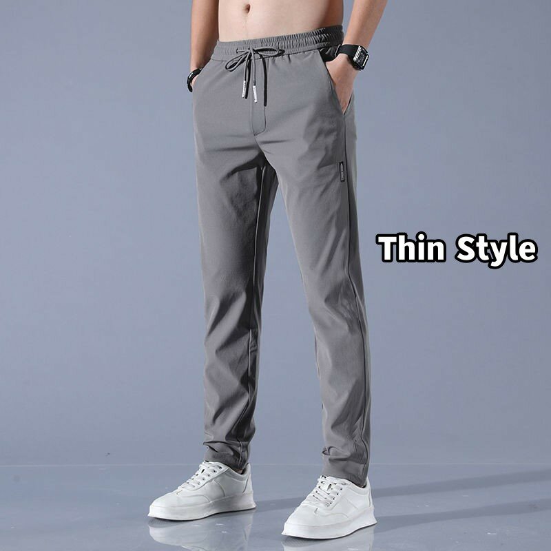 Spodnie na jesień męskie odzież sportowa dresowe spodnie dresowe z elastycznym pasem spodnie bawełniane luźne siłownie Jogger spodnie do biegania męskie M- 5XL
