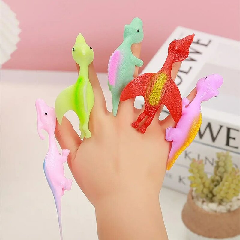 大人と子供のための創造的な指のカタパルト恐竜スリンショット、ストレス解消のための粘着性の壁のおもちゃ、5個、25個、50個