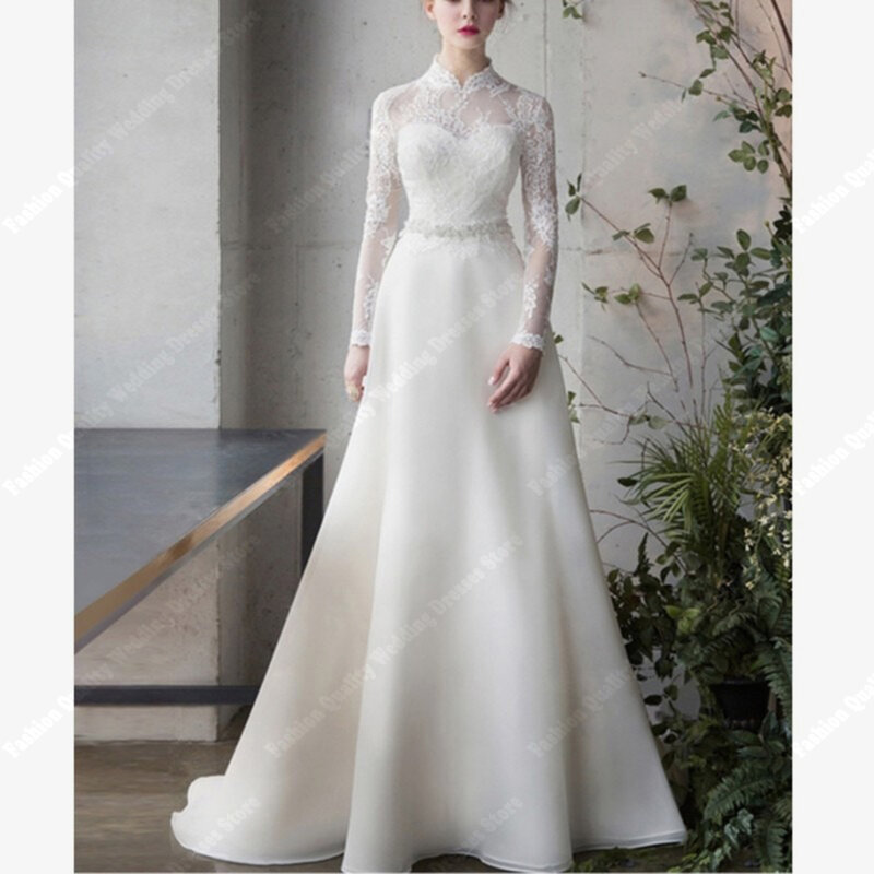 Elegancki biały szlachetne suknie ślubne z pełnym rękawem koronkowa aplikacja o linii A suknie ślubne wykonane na zamówienie klasyczne guziki Vestido De Noiva