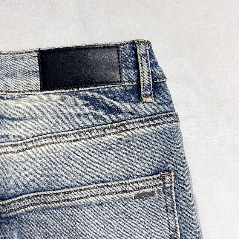 กางเกงขาสั้นของผู้ชายกางเกง5/4เจาะรูแบบลำลองปัก celana pendek DENIM ตัวอักษรโบราณแบรนด์ฤดูร้อนแฟชั่นอินเทรนด์