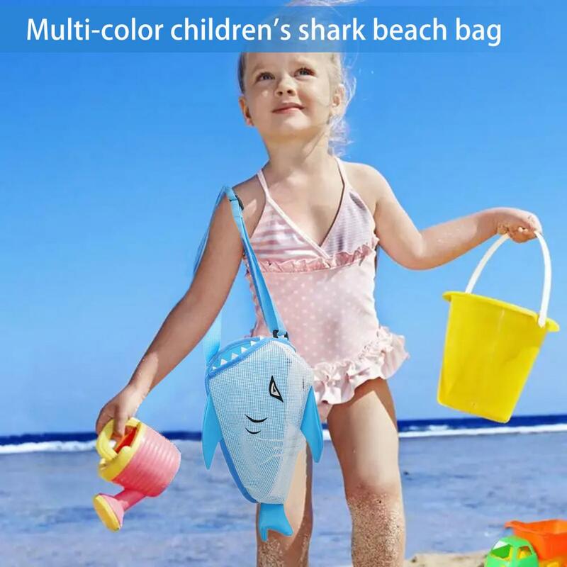 子供のための漫画のサメの形をしたビーチバッグ、通気性のあるメッシュのデザイン、おもちゃのシェル、収納収集、子供の砂のツールオーガナイザー