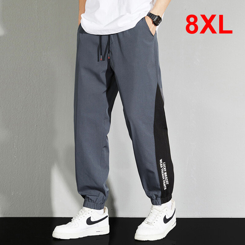 Celana Joger pria, celana Joger pria ukuran Plus 8XL, celana panjang tambal sulam kasual mode ukuran besar pinggang elastis