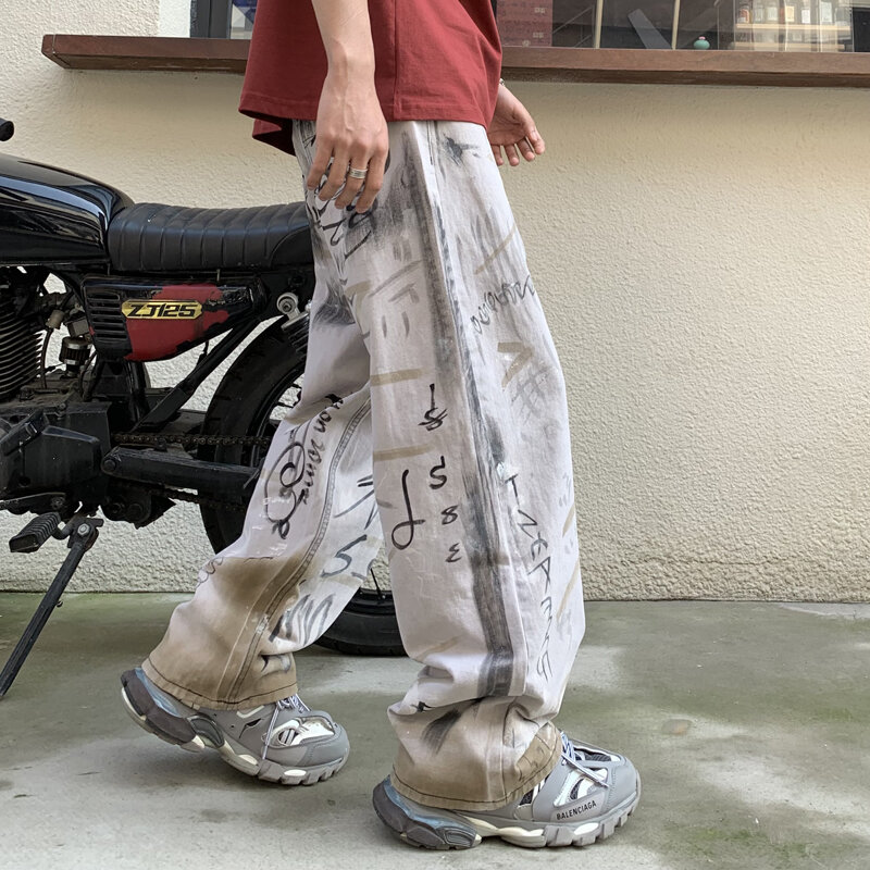 Amerykańska ulica przystojne męskie jeansy z graffiti, luźne, proste, modne spodnie z szerokimi nogawkami