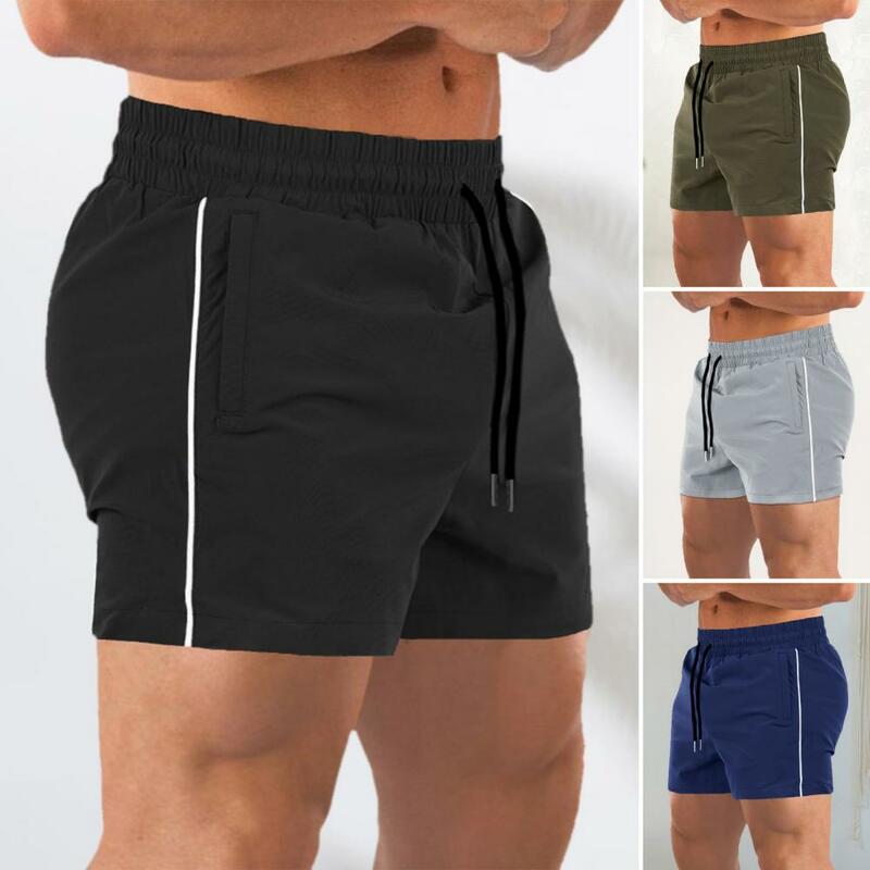 กางเกงเอวยางยืดสำหรับผู้ชายกางเกงกีฬาขาสั้นผู้ชายแห้งเร็วมีกระเป๋าซิปสายรัดเอวยางยืดสำหรับวิ่งฟิตเนส