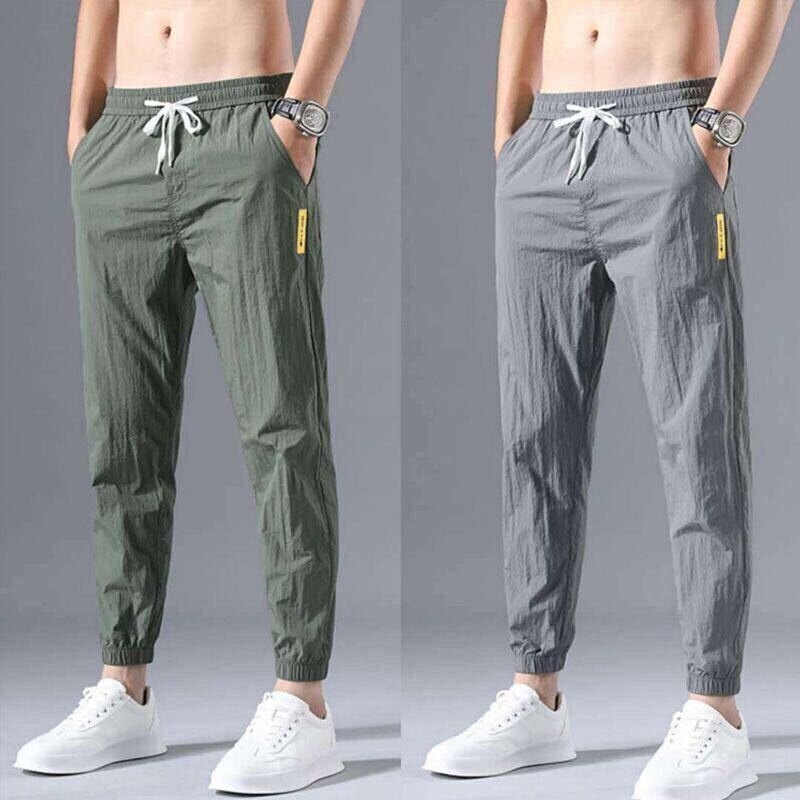 Pantaloni moda coreana estivi da uomo in seta di ghiaccio pantaloni larghi a nove punte classico con coulisse elastico in vita da Jogging