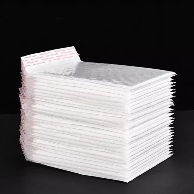 ซองโฟมสีขาวปิดผนึกด้วยตัวเองถุงส่งของอเนกประสงค์ถุงกันน้ำซองจดหมายบุฟองน้ำสำหรับนิตยสารเรียงราย