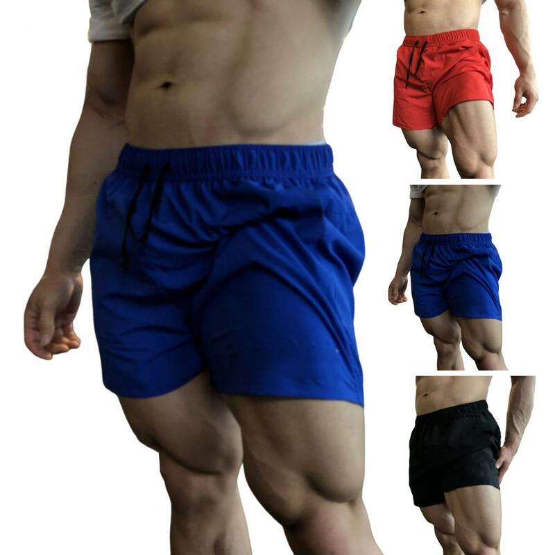 Mid-Rise Elastic Cintura Com Cordão Bolsos Shorts Homens Verão Cor Sólida Solto Basculador Calções Desportivos de Fitness шорты