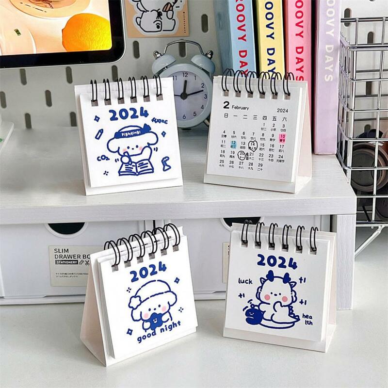 2 buah 2024 kalender meja Mini kumparan mengikat cetak bening kartun Tahun Baru kalender sederhana kartun Desktop untuk rumah kantor sekolah
