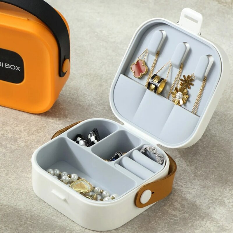 Boîte à bijoux multifonctionnelle portable avec miroir, boîte de rangement en plastique pour matiques, colliers et boucles d'oreilles, voyage