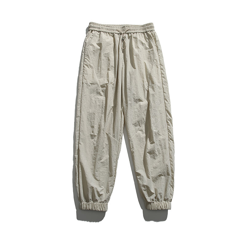 Calça minimalista de cintura elástica masculina com bolsos com cordão, comprimento do tornozelo, perna larga solta casual, monocromática, moda verão