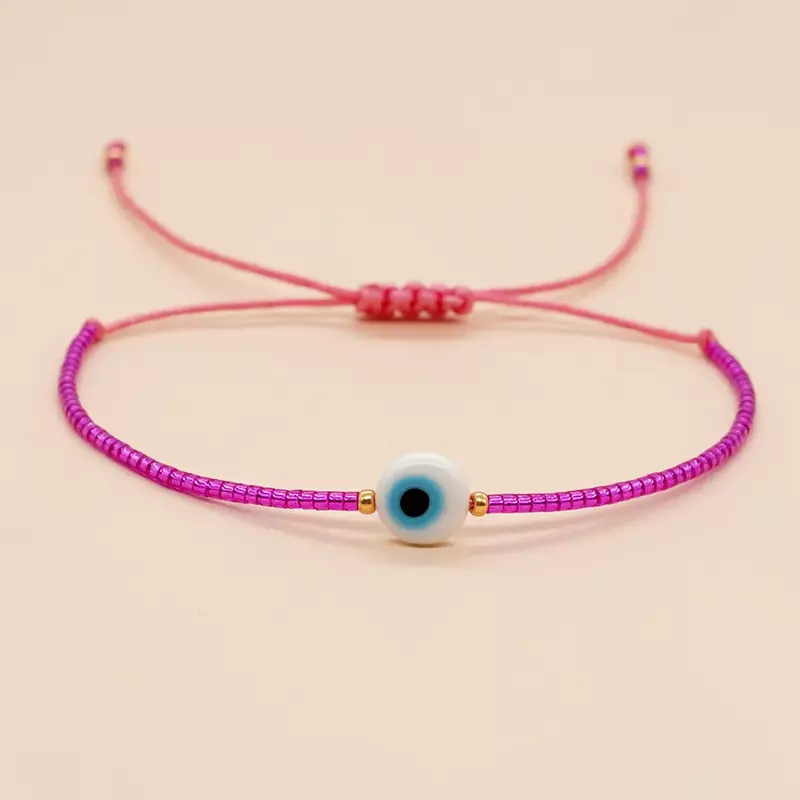 Braccialetto di perline motivo a forma di cuore l'occhio del diavolo lavorato a mano braccialetto di perline di riso regolabile bohémien minimalista alla moda Vintage