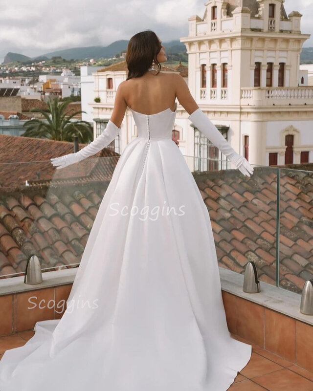 فستان زفاف بياقة مكشوفة الكتفين ، فستان زفاف أبيض ، طول أرضية ، حديقة ، مناسبة رسمية