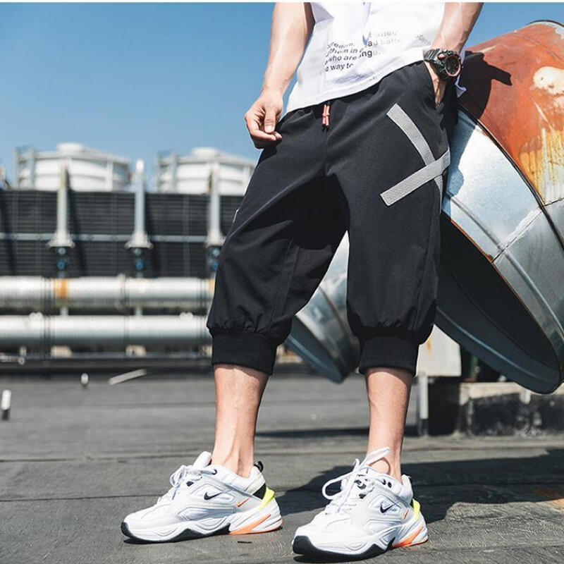 Pantaloncini da uomo estivi pantaloni sportivi multitasche Streetwear pantaloni da jogging larghi casuali vita elastica solido abbigliamento da uomo di fascia alta di lusso