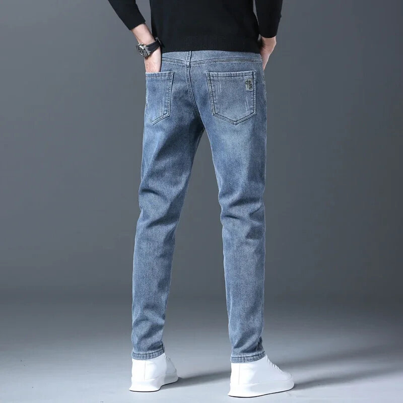 Jeans in pile da uomo ricamati dritti inverno nuovo addensato caldo confortevole Slim Stretch abbigliamento maschile pantaloni in Denim di peluche