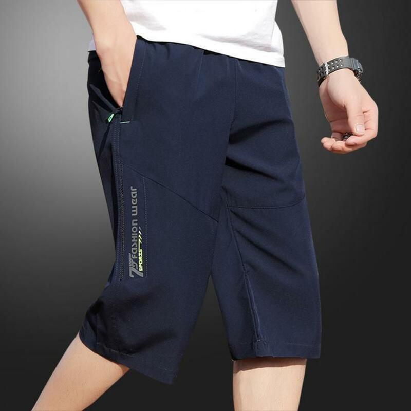Однотонные укороченные брюки, мужские укороченные брюки с эластичным поясом и карманами на молнии, мягкие дышащие удобные брюки до середины икры