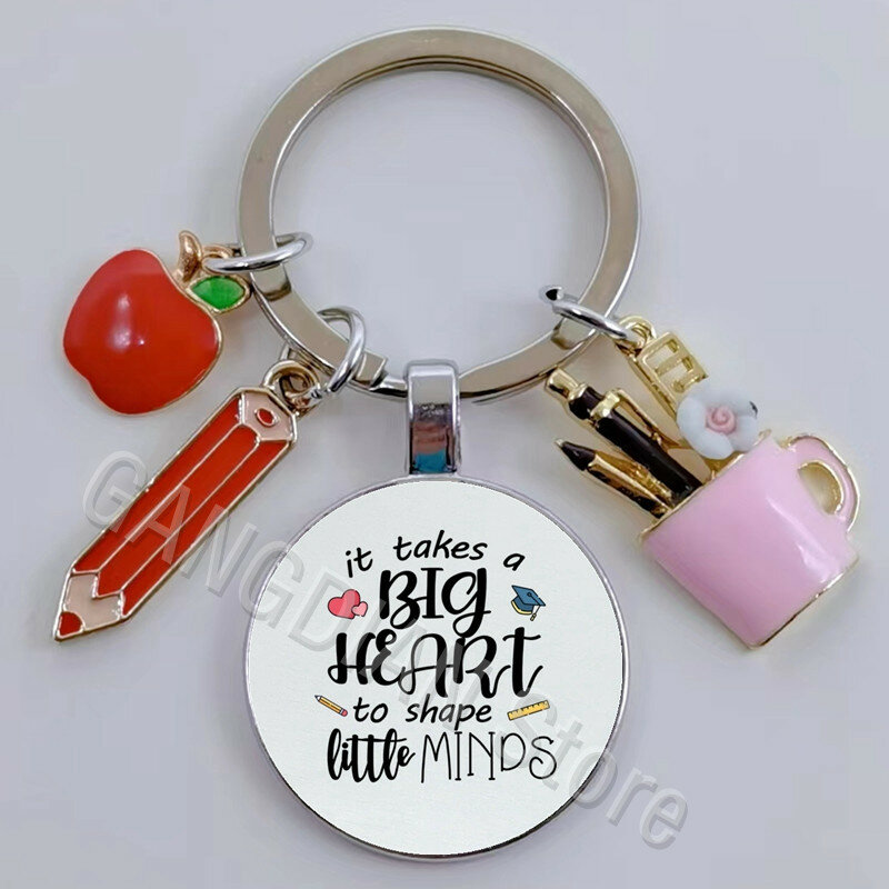 This is a big heart shaping little heart printing DIY handmade glass convex round keychain creative teacher gift