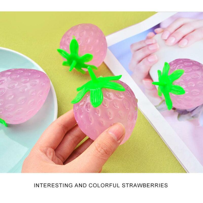 Simulierte farbwechsel nde Erdbeer frucht Hand Anti-Stress Squeeze Ball Dekompression spielzeug für Kinder sensorische aut e4t0