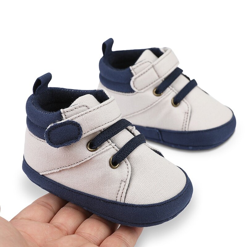 Sepatu mokasin bayi laki-laki, sneaker kanvas kasual balita bayi baru lahir, sol lembut Anti slip untuk pertama kali berjalan