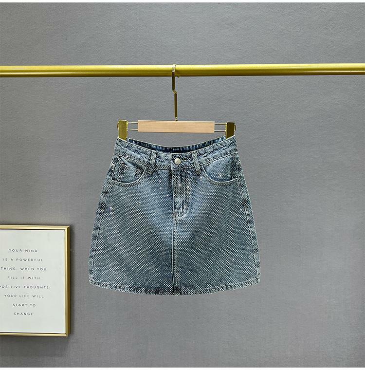 Ciężka branża pełna diamentowa jeansowa spódniczka damska krótka spódniczka 2024 nowa letnia wysoka talia dopasowana europejska spódnica biodrówka na biodra