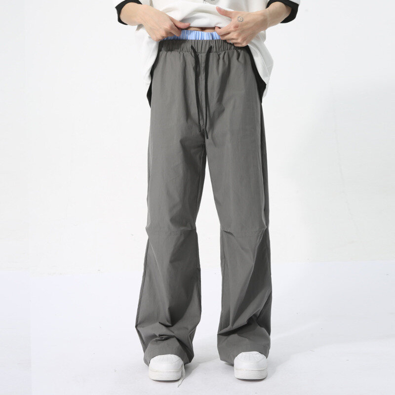 NOYMEI-pantalones de diseño de nicho de moda para hombre, ropa informal de verano, holgados, combinables con todo, Patchwork, Color de contraste, con cordón, WA4405