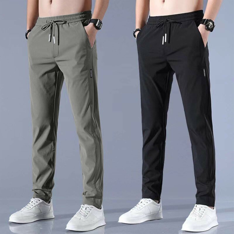 Celana olahraga pria, celana kasual pria Ice Silk 2024, warna Solid, celana Sweatpants kaki lurus bersirkulasi elastis luar ruangan