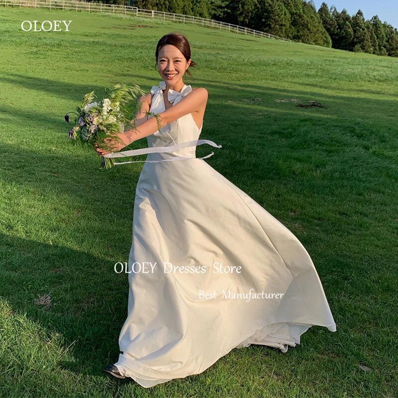 Oloey elegante Seide eine Linie Korea Brautkleider Bogen Schulter Halfter rücken freie boden lange Brautkleider benutzer definierte Strand Fotoshooting