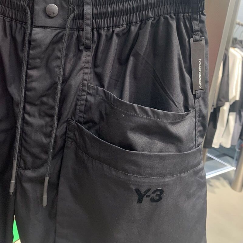 Pantalones cortos transpirables para hombre, Shorts masculinos de estilo coreano, color negro, a la moda, versátiles, 3 Y 2023