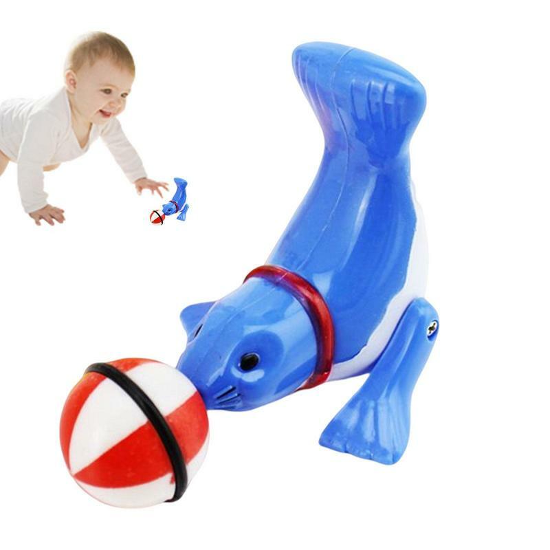 Top Ball Clockwork Dolphin Winding Toy Sea Lion rotazione acrobatica decompressione agitarsi Antistress regalo per bambini Baby