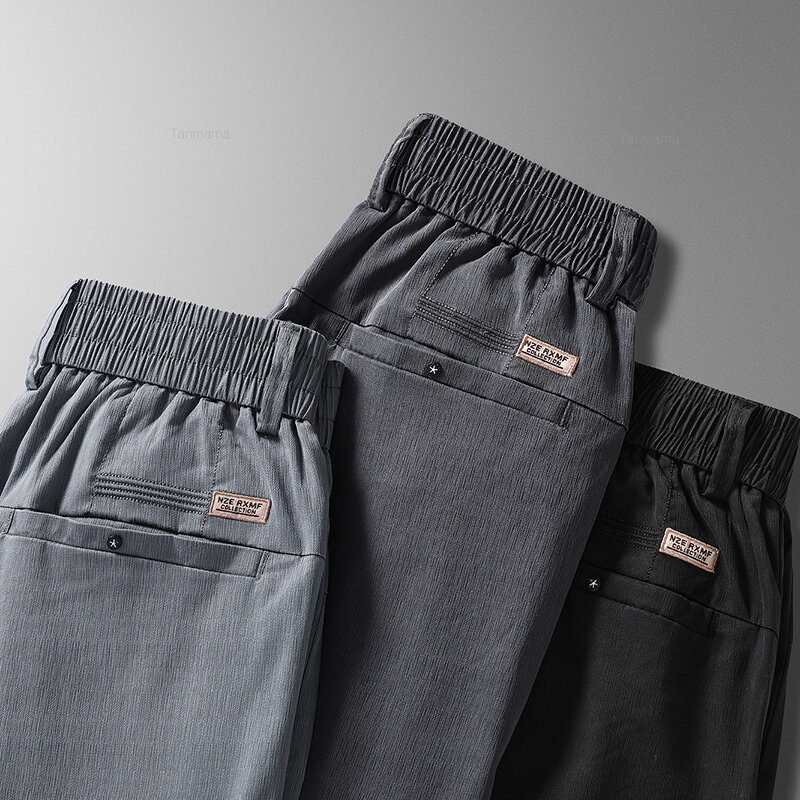 Lyocell กางเกงลำลองผู้ชายแบบบางพิเศษฤดูร้อนกางเกงธุรกิจตรงผ้าไอซ์ซิลค์ยืดหยุ่นระบายอากาศได้ดีสีเทาดำ