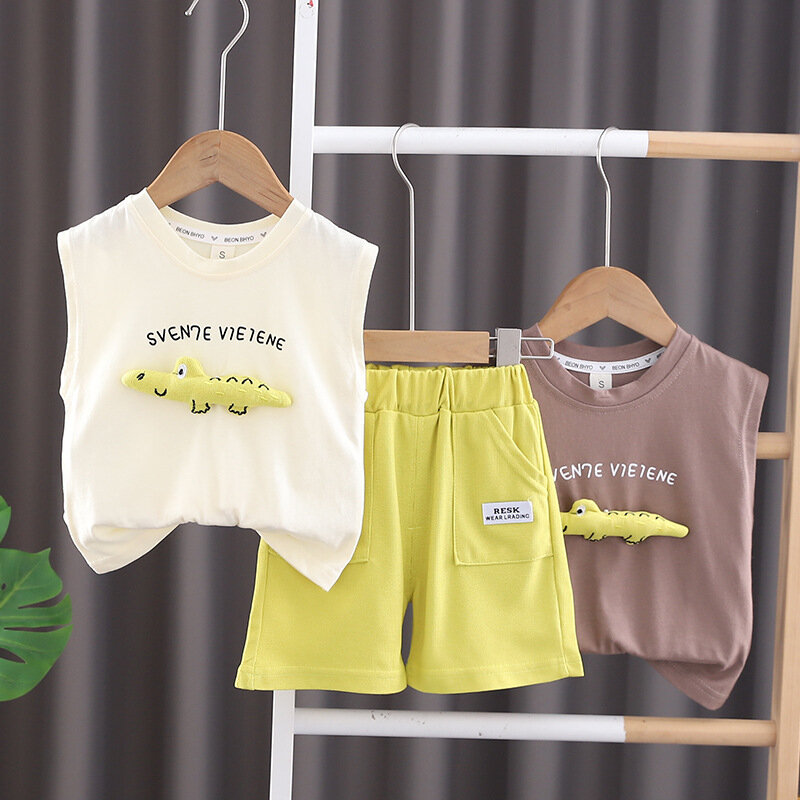 Maluch letnie ubrania dla dzieci 2024 moda Cartoon dinozaur z okrągłym dekoltem z krótkim rękawem t-shirty i szorty dla chłopców zestaw odzieży z butiku