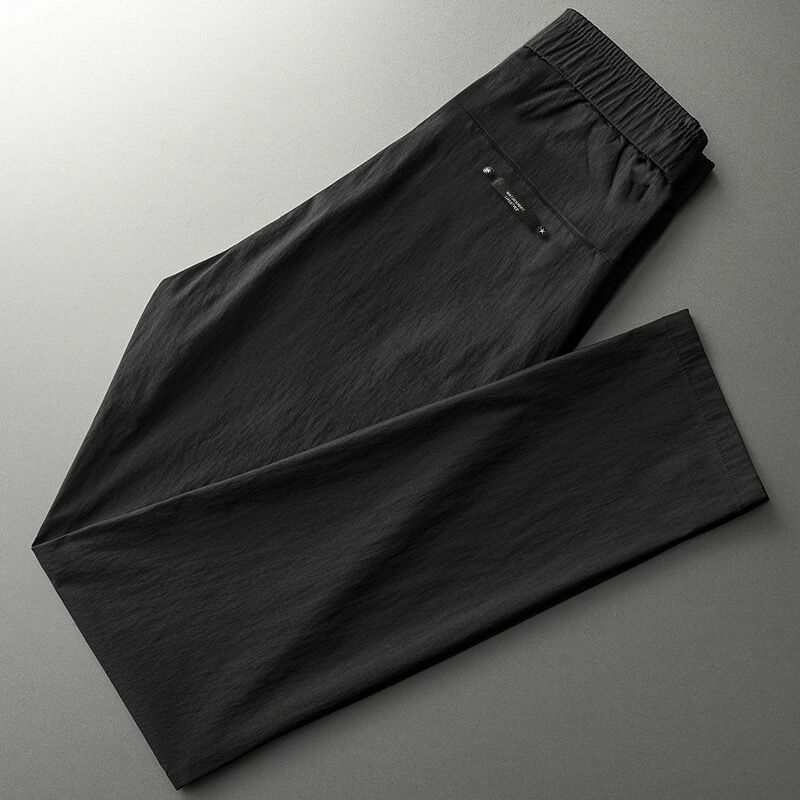 Новинка лета 2024, мужские эластичные модные однотонные удобные облегающие универсальные повседневные брюки с карманами и кулиской в стиле пэчворк