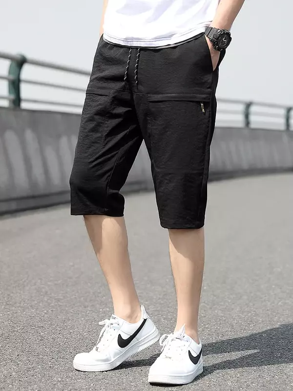 Plus Size letnie spodnie capri męskie oddychające fajne krótkie spodnie dresowe do łydek 3/4 proste luźne przycięte spodnie na co dzień 8XL